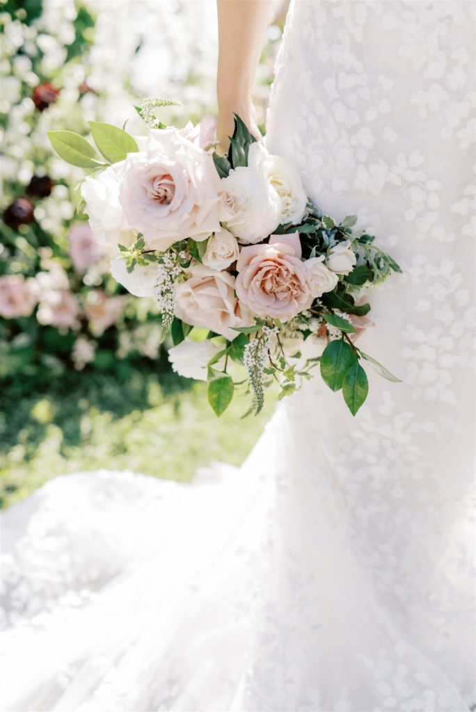 Petit Bridal bouquet with blush and white roses and greenery
